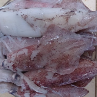 Кальмары тушеные в сливках с овощами