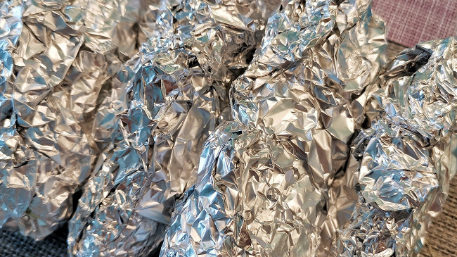 Фото шага рецепта Сливочная пряная кукуруза, запеченная в фольге 152667 шаг 10