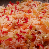 Пилаф с тыквой, красными перцами и жареными тыквенными семечками