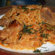 Утка, тушеная с капустой