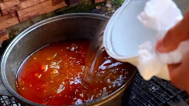 Фото шага рецепта Мясной суп с тыквой на костре 151528 шаг 7
